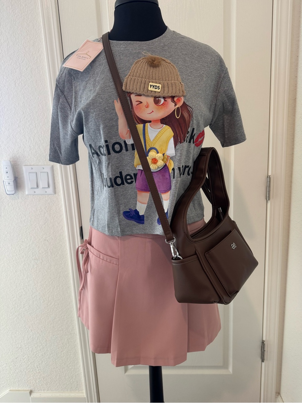 Gray Crop Top Graphic Tee, Pink Skorts and House of LittleBunny Bag.